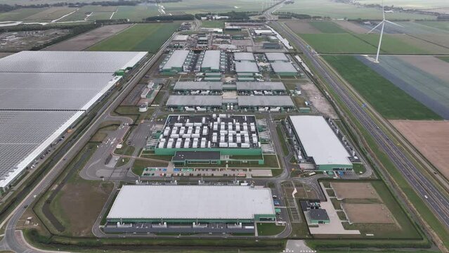 Datacenter building complex computing center in Hollands Kroon. Data technology ICT equipment building housing like servers. Building facility communication tech.