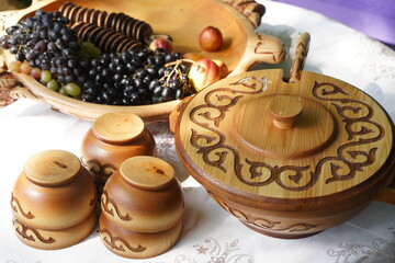 Wooden carved tableware with Kazakh national pattern