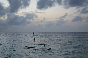 Fishing boat flooded in the sea