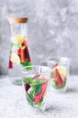 Summer refreshing drink with rhubarb, lemon and mint