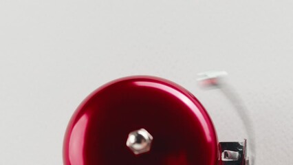 Red back to school ringing on the white wall