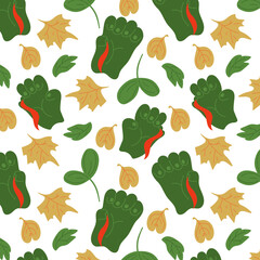 Autumn pattern with zombie hands. Cartoon zombie hands and green and yellow leaf fall.