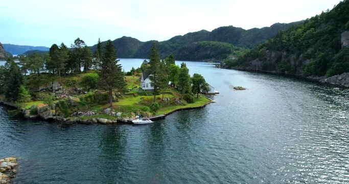 Flekkefjord Norway dream house rotation in the island in bay fjord in Norway aerial HDR HFR footage