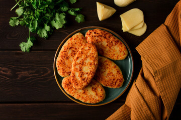 Chvishtari, corn flour tortillas with cheese, pastries, Georgian cuisine, Mchadi, homemade, top view, on a wooden table, no people,