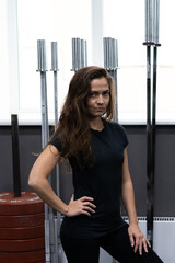 Young woman meditates, doing yoga poses and asana. Fitness girl enjoying yoga indoors.	
