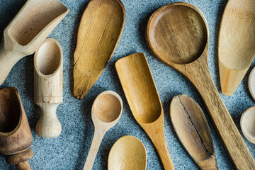 Overhead view of assorted wooden spoons and kitchen cooking utensils