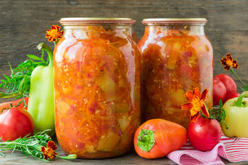 Canned eggplant and bell peppers in tomato sauce. Eggplant and pepper salad in tomato sauce