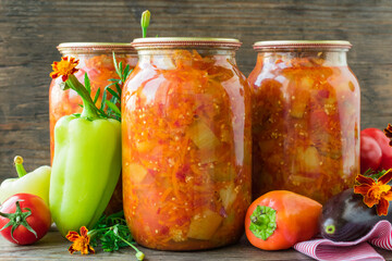 Canned eggplant and bell peppers in tomato sauce. Eggplant and pepper salad in tomato sauce