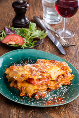 lasagna on a green plate