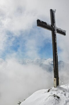 summit cross on the mattstock above amden st.gallen. Mattstogg. Hiking in winter. High quality photo