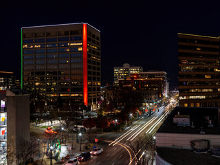 Obraz premium Downtown Boise at night with streaking car lights