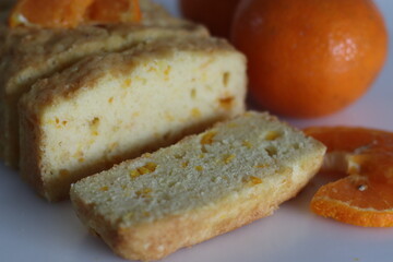 Fototapeta na wymiar Orange cake. Tea time cake with orange juice and orange pulp