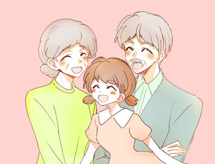 笑顔のおじいさんとおばあさんと孫