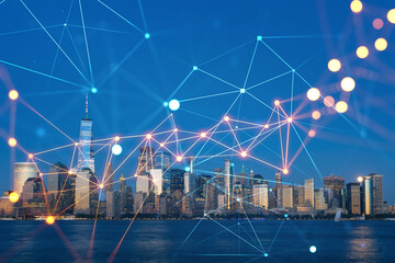 Skyline of New York City Financial Downtown Skyscrapers at night. Manhattan, NYC, USA. View from New Jersey. Social media hologram. Concept of networking and establishing new people connections