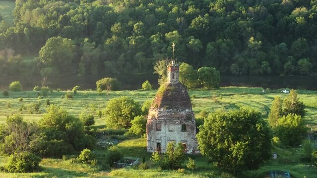 Beautiful Sword river and ancient ruined church in the Tula region at dawn,Russia
