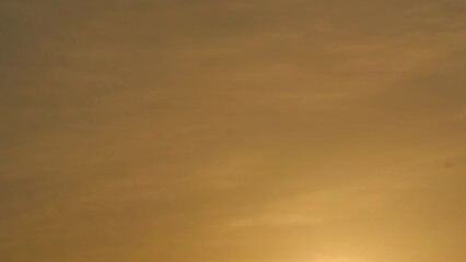 Closeup of hand launching white toy plane, closeup shot. Throwing foam airplane glider into the sky during a golden sunset. Concept of flight, freedom, childhood, nostalgia