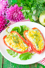 Stuffed bell pepper. Bell pepper with cottage cheese and herbs. Baked pepper stuffed with cottage cheese and herbs