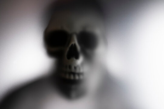 Shadow blur of horror skeleton. Halloween background.