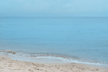 Fototapeta na wymiar Picturesque view of beautiful sea waves on sandy beach