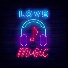 Obraz premium Love music neon signboard. Luminous lettering. Headphones and note. Vector stock illustration