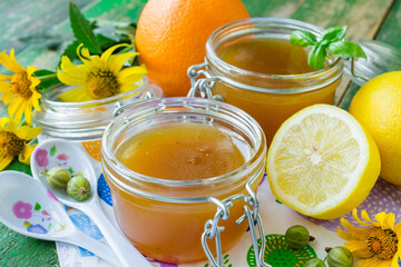 Gooseberry jam with orange and lemon. Gooseberry marmalade. Homemade gooseberry jam with lemon and orange