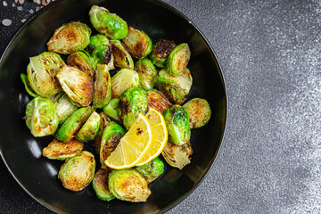 Brussels sprouts fried vegetable healthy meal food snack diet on the table copy space food background rustic top view keto or paleo diet veggie vegan or vegetarian food no meat