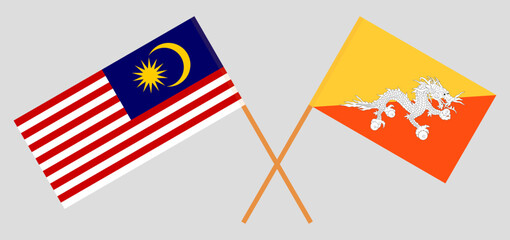 Crossed flags of Malaysia and Bhutan. Official colors. Correct proportion