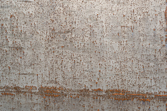 weathering steel sheet (corten steel) background, corrosion just started