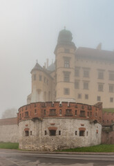 Fototapeta na wymiar Wawel castle in the morning fog, Krakow, Poland