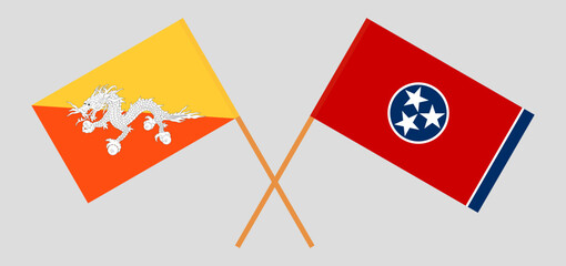 Crossed flags of Bhutan and The State of Tennessee. Official colors. Correct proportion