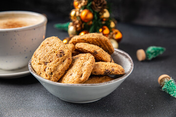 christmas cookie chocolate drops, cinnamon, ginger new year sweet dessert home holiday meal food snack on the table copy space food background