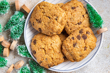 christmas cookie chocolate drops, cinnamon, ginger new year sweet dessert home holiday meal food snack on the table copy space food background