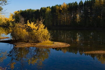 Russia. South of Western Siberia, Kuzbass. A windless sunny evening at the Pritomsky quarries of Novokuznetsk in the middle of autumn.