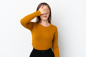 Young caucasian woman isolated on white background covering eyes by hands. Do not want to see something