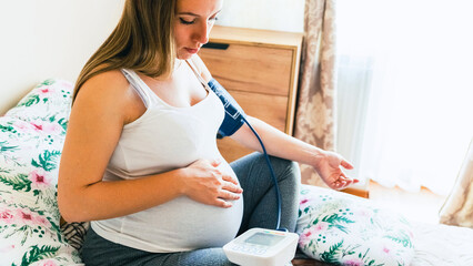 Pressure test pregnancy woman check. Pregnant mother with blood test hypertension check pressure....
