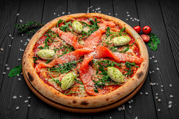 Pizza with salmon and cream cheese.