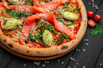Pizza with salmon and cream cheese.