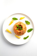 rice pilaf with sauce and ornamental pepper