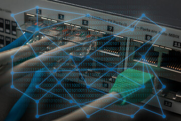 Concept of networks and computer security. Network diagram with binary text. Network equipment or switch in the background.