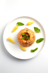 rice pilaf with sauce and ornamental pepper