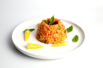 rice pilaf with sauce and ornamental pepper