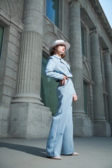 Fototapeta na wymiar lady in blue pantsuit
