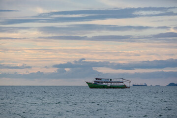 Ship in sea under sky