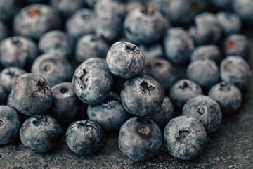 Wet ripe blueberries close up, macro shot.