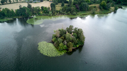 aerial photo of a loch�in Scotland with a little island in the centre