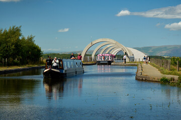 Two boats just lifted by the Falkirk Wheel - sailing toward the tunnel