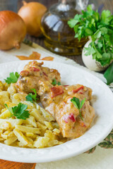 National Georgian dish - Chakhokhbili from chicken. Chicken stew with vegetables. Selective focus