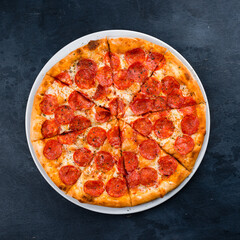 Traditional italian fresh baked pizza with copy space for design restaurant menu
