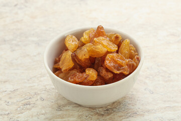 Sweet yellow raisin in the bowl
