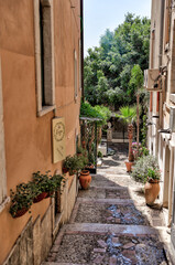 Taormina, Italy - July 22, 2022: Scenic streets and sidewalks in Taormina, Sicily
